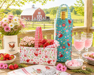Smitten Chicken fabric basket on a farm table with strawberries and wine tote