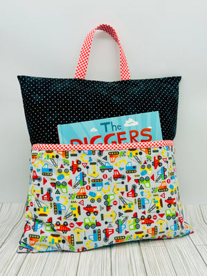 Handmade black and white transportation print reading pillow cover with book in front pocket