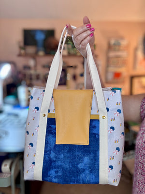 Lakeside Tote showing mustard faux leather flap open with magnetic snap
