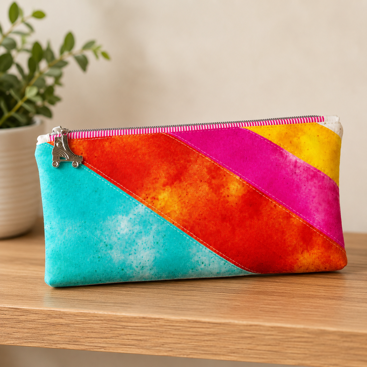 colorful zipper pouch with roller skate zipper pull